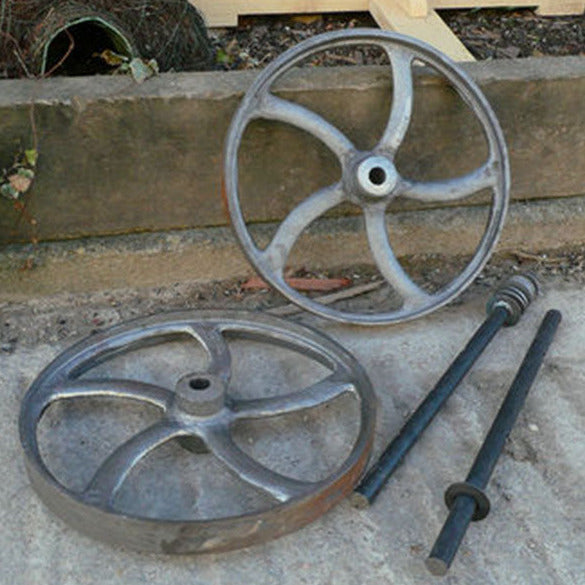 A Pair Of Traditional Cast Iron Wheels